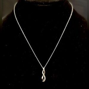 Sterling and diamond ribbon pendant necklace​​​​​​​​